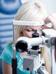 Woman having an eye checkup