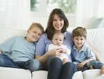 Woman sitting with her kids