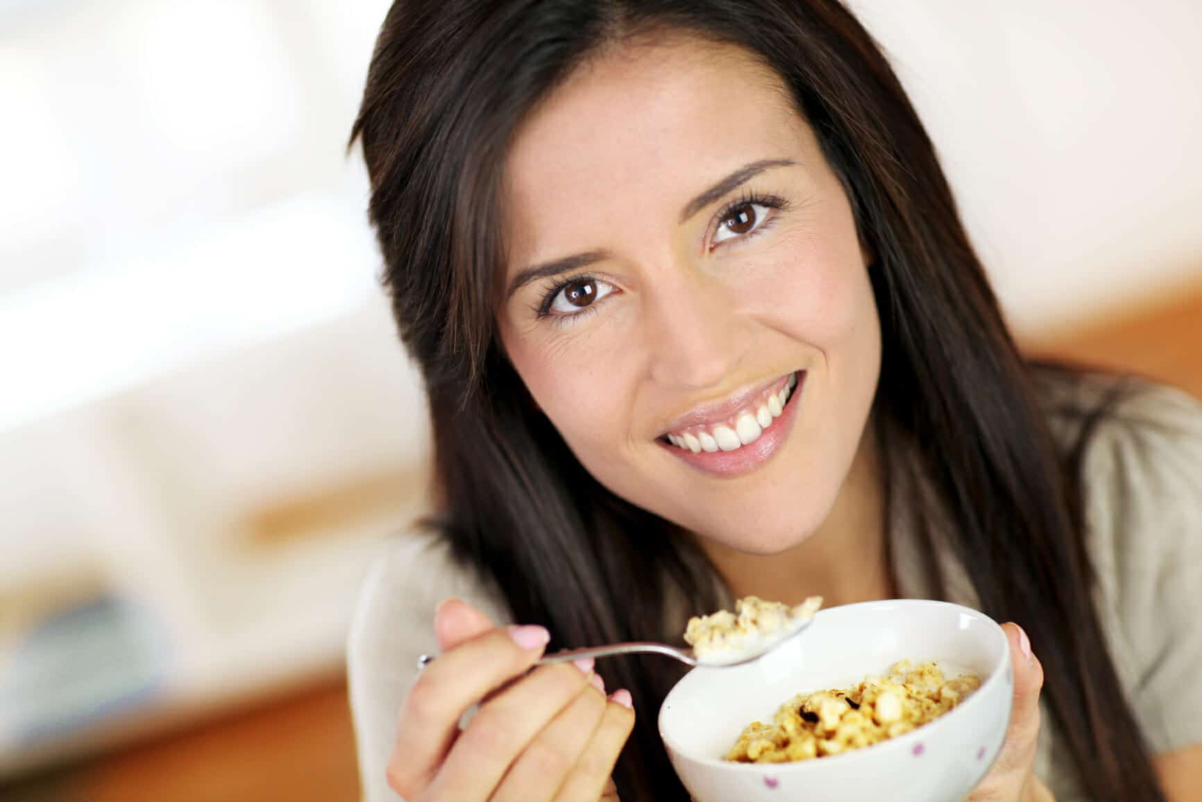 Woman eating cereal