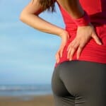 Girl with a lower back pain