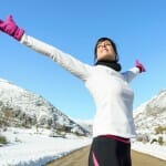 Fit woman looking happy in winter