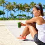 woman enjoying a Purium shake